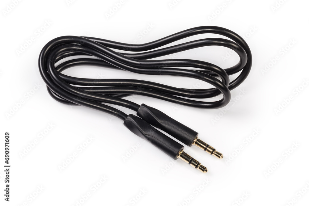 Analog audio cable with mini stereo connectors on white surface Analog audio cable with mini stereo connectors on white surface
