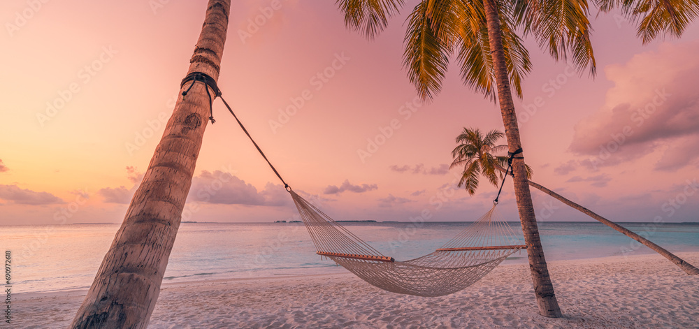 Relax vacation leisure lifestyle on exotic tropical island beach, palm tree hammock hanging calm sea. Paradise beach landscape panoramic sunrise sky clouds amazing reflections. Beautiful nature banner - obrazy, fototapety, plakaty 