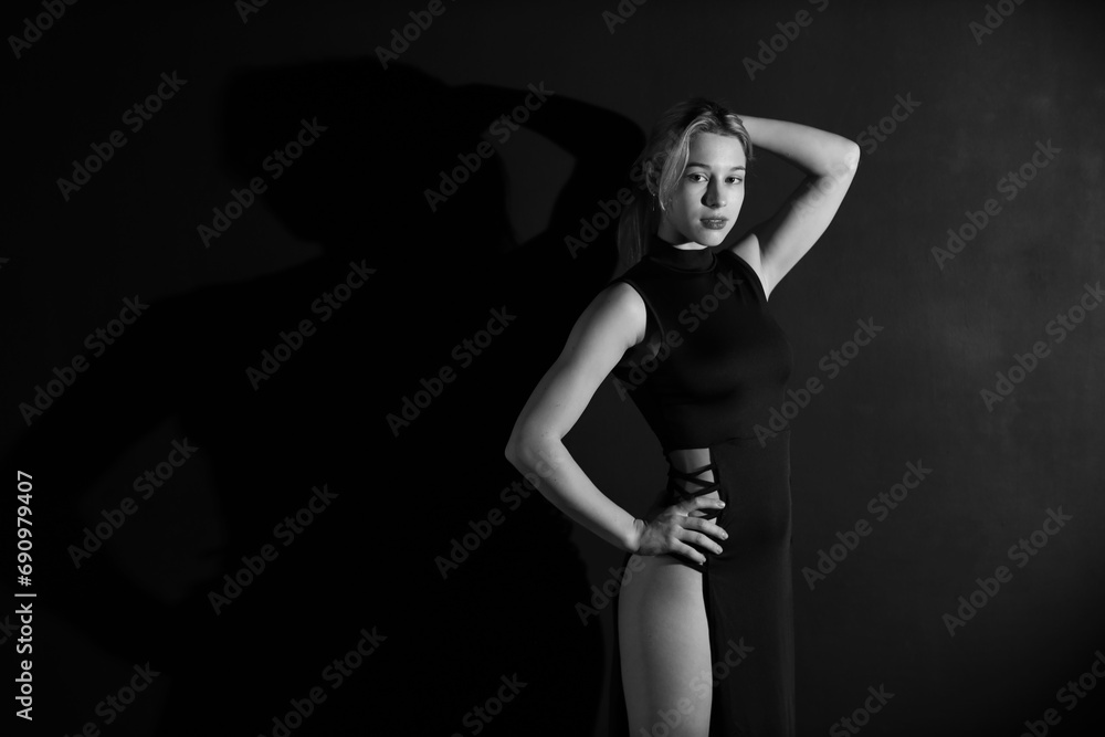 Black and white low key portrait of young woman Black and white low key portrait of young woman