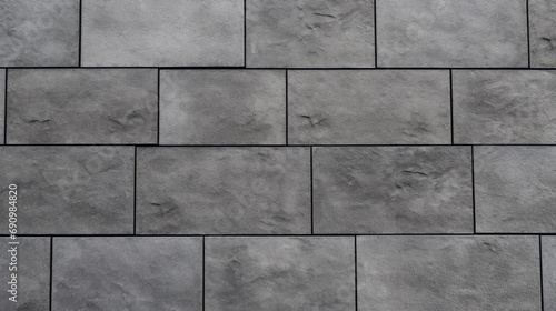 Close-up grey Clinker tiles wallpaper imitation brick for finishing works. Material for covering the facade and walls. Modern clinker tile imitating brickwork. photo