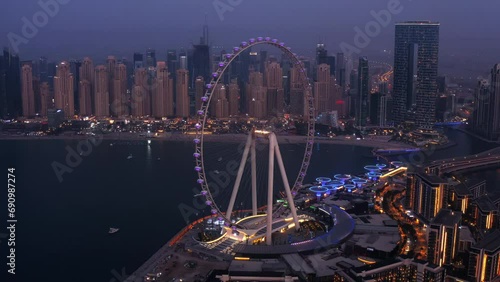 Wallpaper Mural Aerial Eye of Dubai Ferris wheel city lights twilight, jbr beach in background Torontodigital.ca