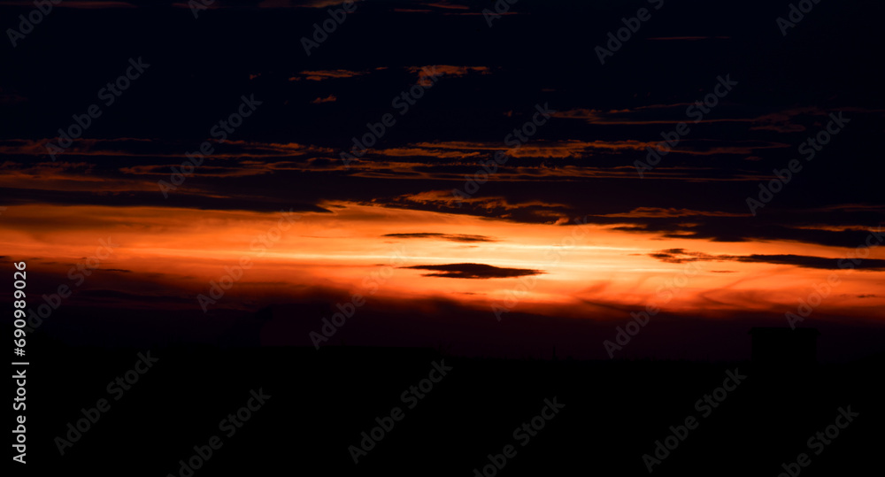 Sunset sky background panorama concept. Top view of horizon Evening sunset sky and morning sunrise in Colorful city with copy space. Empty beautiful sky, panoramic view, tropical bright twilight Sunset sky background panorama concept. Top view of horizon Evening sunset sky and morning sunrise in Colorful city with copy space. Empty beautiful sky, panoramic view, tropical bright twilight
