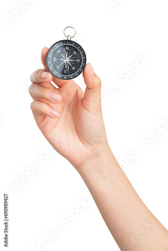 Hand holding compass on isolated background.