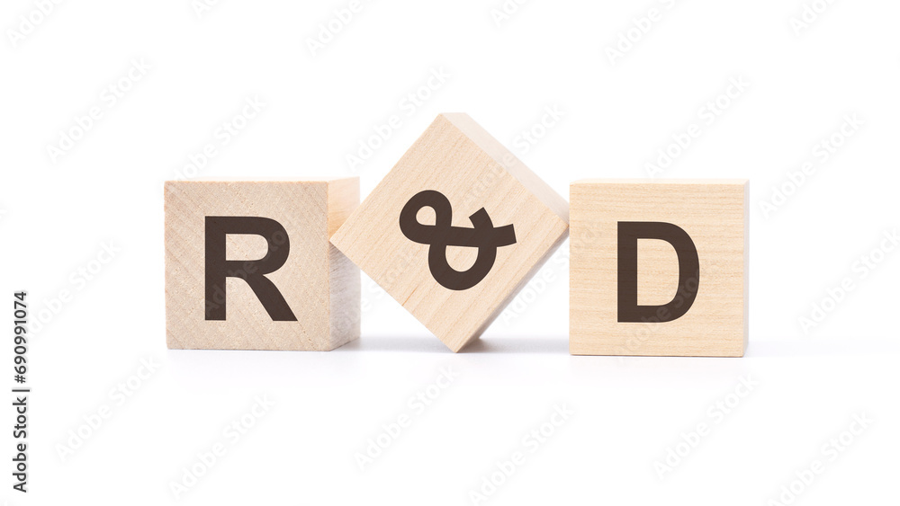 R and D - research and development symbol. wooden cubes with acronym R and D. white background. business and R and D concept. copy space.