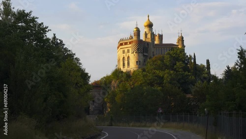 Iconic Rocchetta Mattei fortress seen from the road in Bologna region, Italy photo