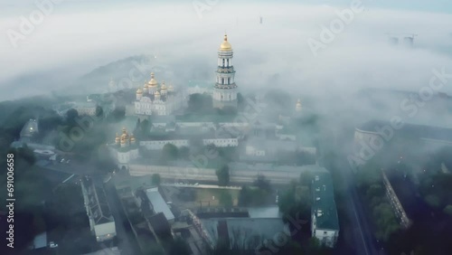 Aerial view of the Kiev Pechersk Lavra, Kyiv, Ukraine. Morning heavy summer fog. Great video for commercials photo