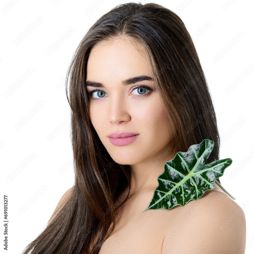 Beauty female portrait. Beautiful young woman holding green leaf over white background. Healthcare, youth and aging, spa, cosmetology concept. Beauty female portrait. Beautiful young woman holding green leaf over white background. Healthcare, youth and aging, spa, cosmetology concept.