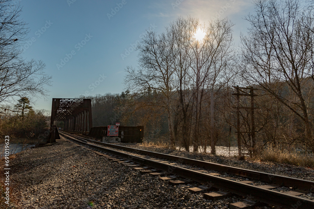 Fototapeta premium Train trestle over the Delaware River all the Ten Mile River Trail