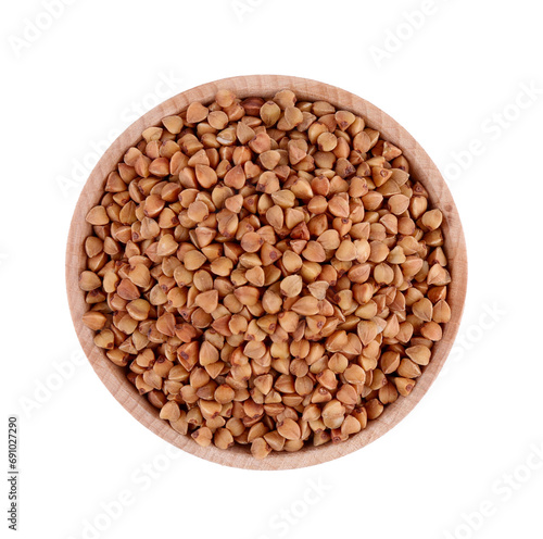 Dry buckwheat in wooden bowl isolated on white, top view