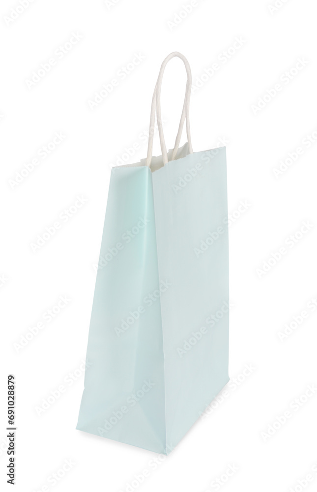 One light green paper shopping bag isolated on white One light green paper shopping bag isolated on white