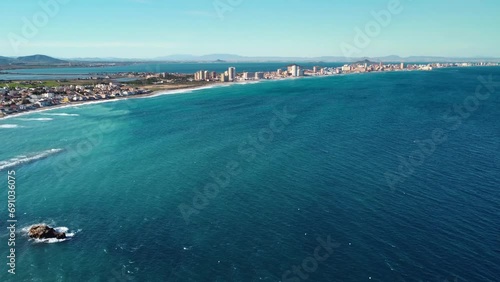 Wallpaper Mural Aerial drone perspective of famous region La Manga, Murcia Province. Spain. "Cabo de Palos" - Cape Palos. Seaside sandspit of Mar Menor in the Region of Murcia. Drone slowly descending Torontodigital.ca
