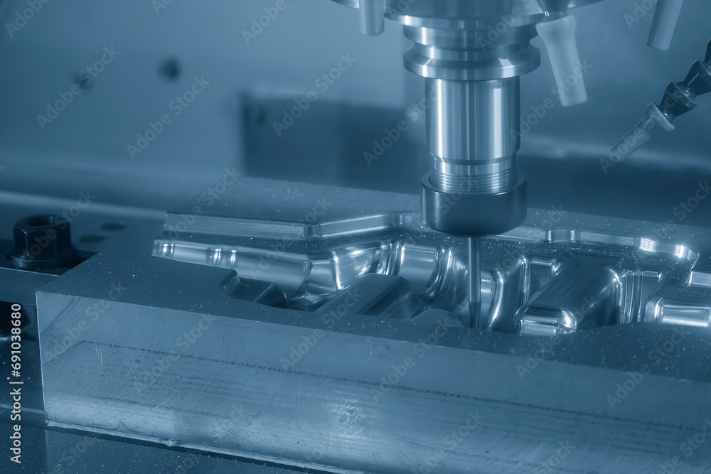 The CNC milling machine cutting forging mold part by solid ball end mill tool. The CNC milling machine cutting forging mold part by solid ball end mill tool.