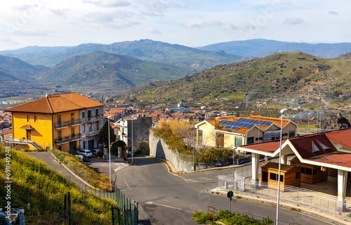 Panoramic view of Bronte town famous for Sicilian Pistachio over Simeto river valley on western slope of Mount Etna volcano in Catania region in Sicily, Italy