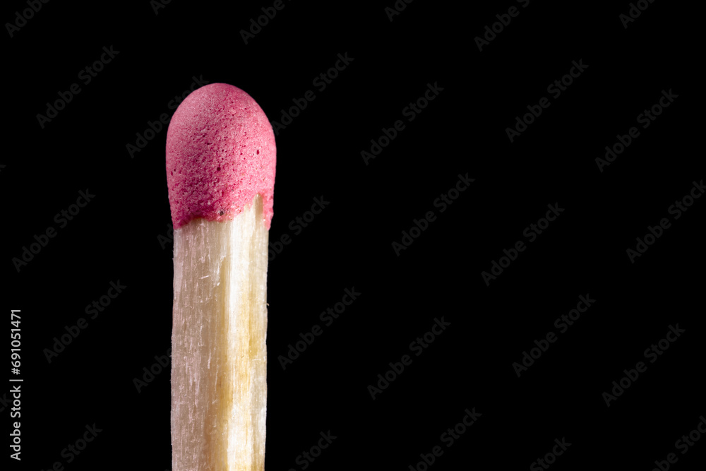 Wooden match with pink sulfur head closeup Wooden match with pink sulfur head closeup