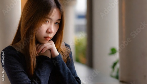 depressed young adult woman or girl, teenager girl looks tired or annoyed 