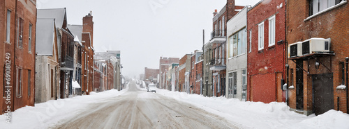 Panoramic view of a street in winter in an old neighborhood of Montreal  photo