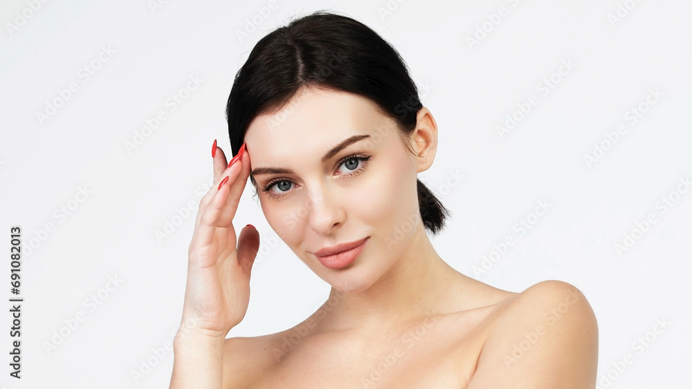 Close-up beauty portrait of young woman. Beauty Spa Woman with perfect skin. Woman with clean healthy skin on white background in the studio. Skincare concept Close-up beauty portrait of young woman. Beauty Spa Woman with perfect skin. Woman with clean healthy skin on white background in the studio. Skincare concept