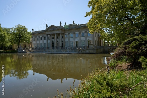 Pond and palace on isle in Warsaw city in Poland