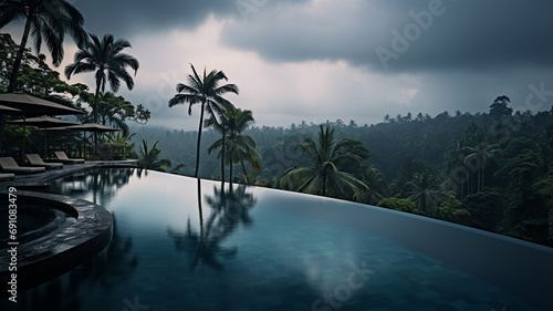 swimming pool overlooking palm trees on an exotic holiday