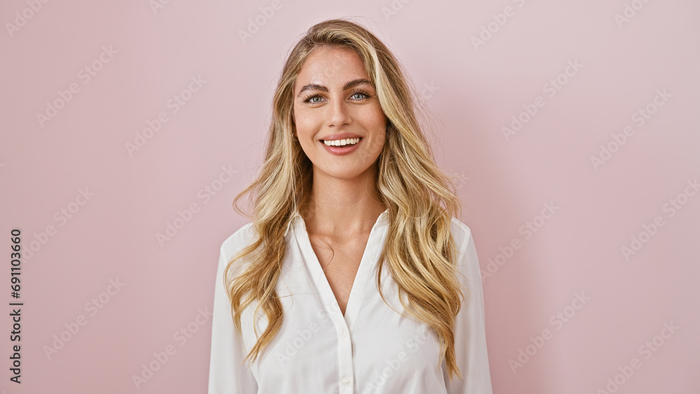 Bright and joyous, a confident, young blonde woman radiating positive energy, joyfully smiling and standing isolated over a vibrant pink background! Bright and joyous, a confident, young blonde woman radiating positive energy, joyfully smiling and standing isolated over a vibrant pink background!