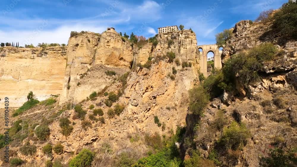 Panoramic view of Puente Nuevo Bridge on sunny day in Ronda, Spain Panoramic view of Puente Nuevo Bridge on sunny day in Ronda, Spain