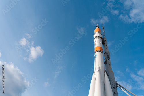 Fototapeta Naklejka Na Ścianę i Meble -  Russian space transport rocket. Real Soyuz spacecraft as monument in summer sunny day. Samara, Russia - 30 Sep 2023