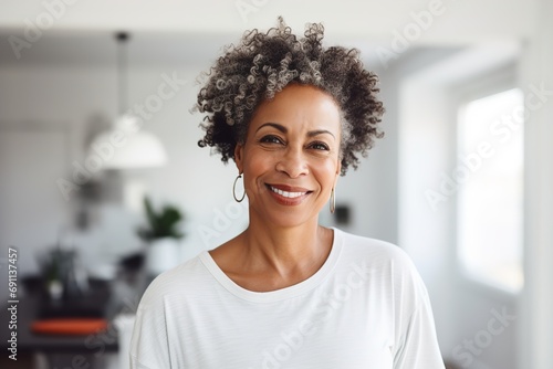 woman happy portrait female beautiful smiling old home black african american one alone lonely fun happiness mature elderly active lady photo