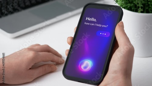 Using smart virtual assistant on smartphone. AI voice assistant app for mobile phone.