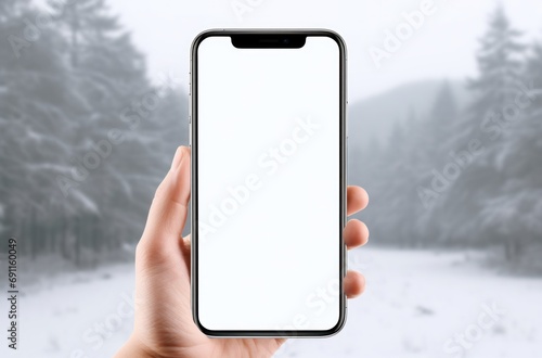 woman holding handphone with a white screen