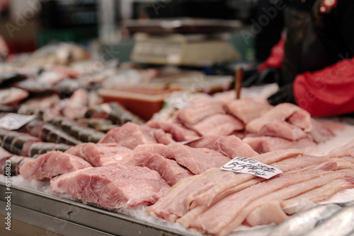 A Variety of Fresh Meats Displayed on a Table at Obor Fisher Market