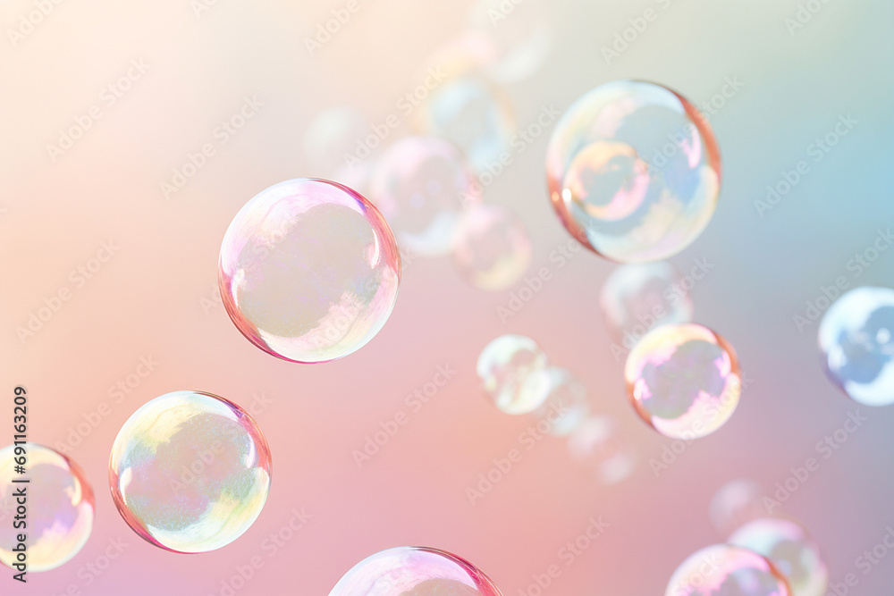 Soap bubbles floating in the air on pastel gradient background. Iridescent bubbles. Dreaming, fun and joy concept. Abstract pc desktop wallpaper. Cleaning and washing theme