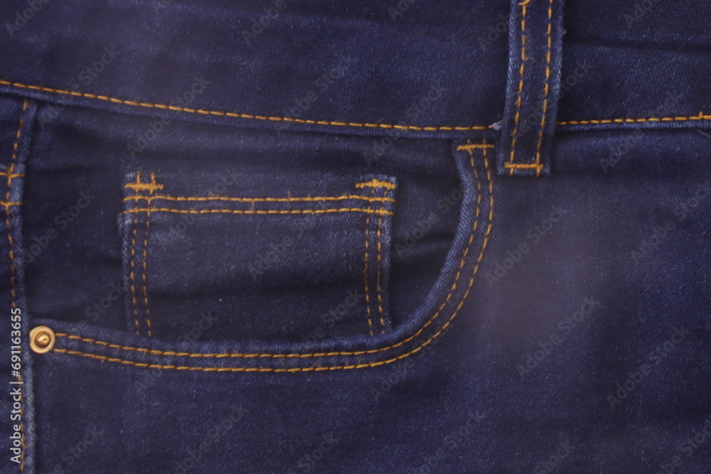Blue jeans with front pocket close up Blue jeans with front pocket close up