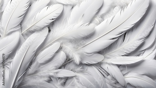 Background of elegant white feathers. The texture of light bird feathers. A voluminous pattern of elements. Desktop wallpapers.