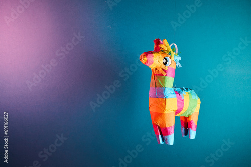 Traditional mexican dunky pinata craft made of paper for posadas and birthdays photo