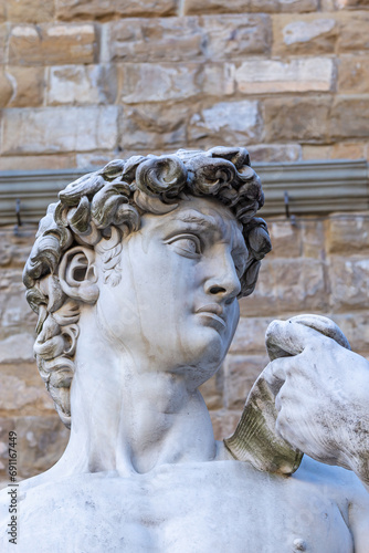 Head of white marble statue of David at Piazza della Signoria square, Florence, Tuscany, Italy