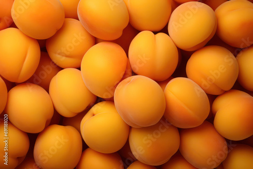 Background of velvety orange apricots. Apricot day. Place for text.