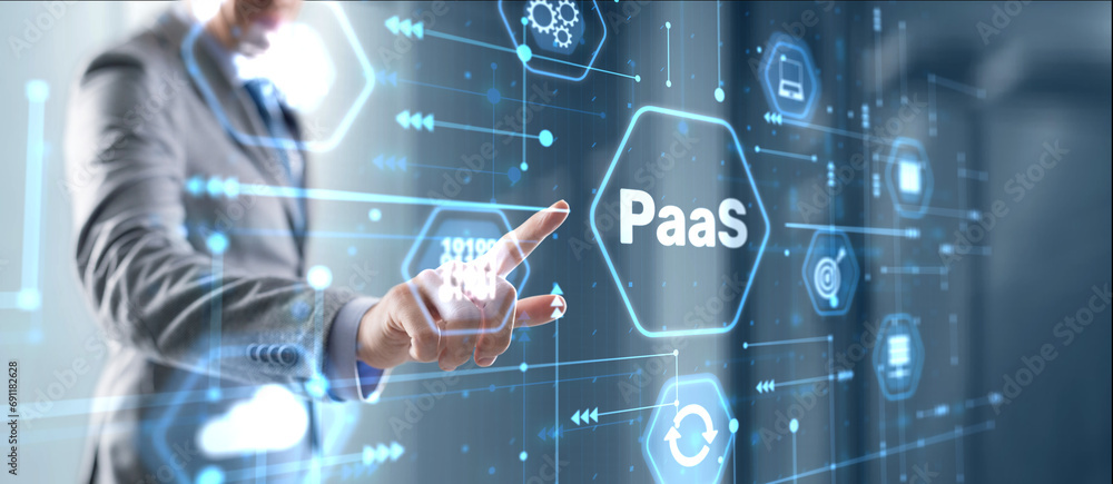 Hand pressing button on interface PaaS, Platform as a Service. Internet and networking concept Hand pressing button on interface PaaS, Platform as a Service. Internet and networking concept