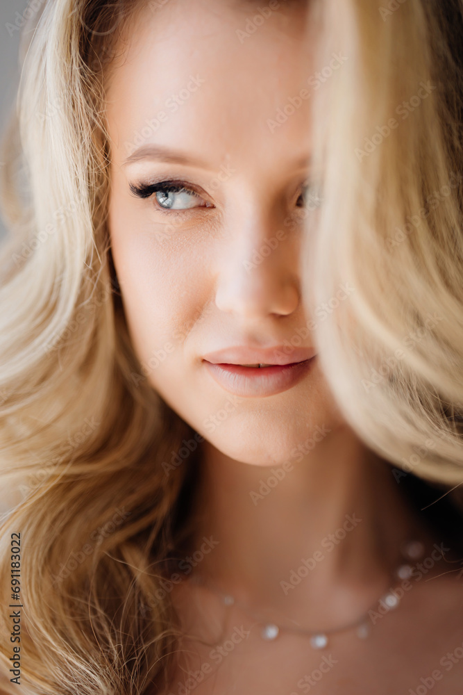 Portrait of a beautiful young blonde woman. Women's beauty. Portrait of a beautiful young blonde woman. Women's beauty.