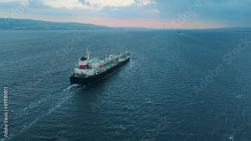 Crude Oil tanker carrier ship underway through Dardanelles Strait, aerial view, concept worldwide logistic and global trade photo