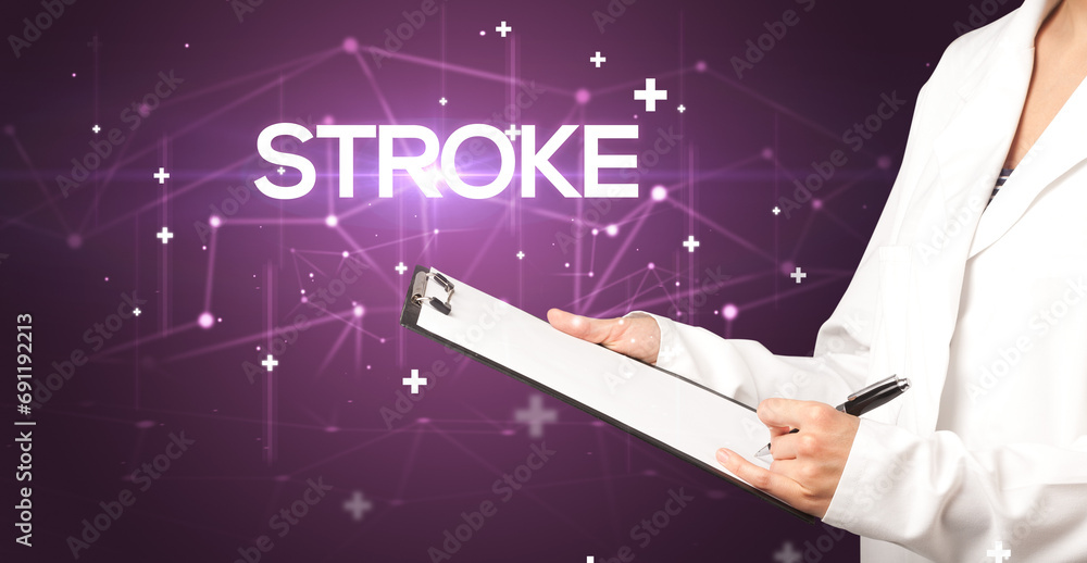 Doctor fills out medical record Doctor fills out medical record