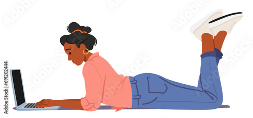 Woman Hunches Over Her Laptop, Lying On Belly, Adopting Improper Body Posture. Her Back Strains As She Works