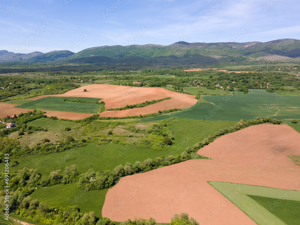 Obraz premium Aerial view of rural land near town of Godech, Bulgaria