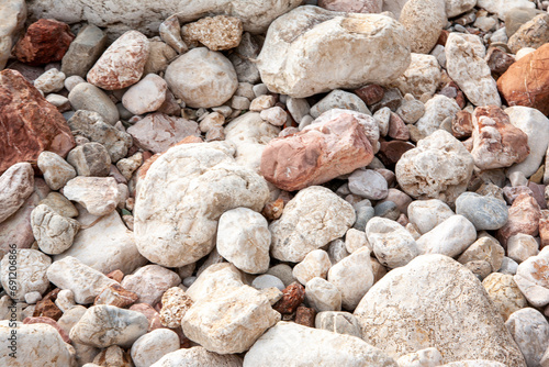 Background from large and small stones, close-up. Stone beach for publication, poster, calendar, post, screensaver, wallpaper, postcard, banner, cover, website. High quality photo