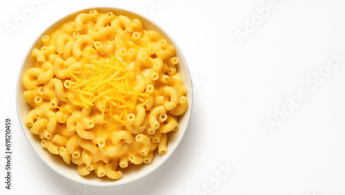 Top view of a bowl of hot cheesy macaroni and cheese isolated on white background with copy space