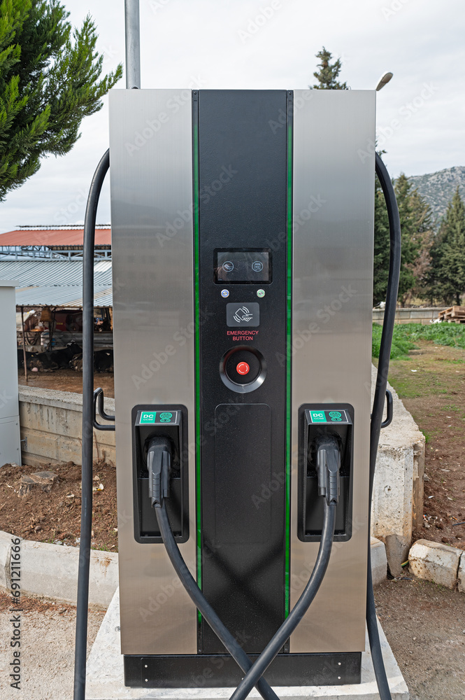 Electric vehicle filling station at the petrol station. Electric vehicle filling station at the petrol station.