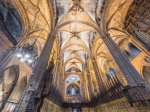 Interior the historic Barcelona Cathedral, also known as the Cathedral of the Holy Cross and Sait Eulalia.  The cathedral is located in the Gothic Quarter of Barcelona, Spain photo