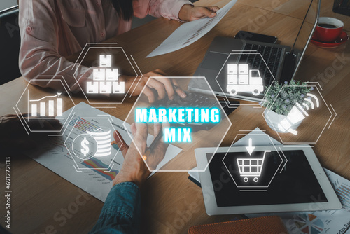 Marketing Mix concept, Business team analyzing income charts and graphs on office desk with marketing mix icon on virtual screen, price, place, promotion, product, people and physical environment.
