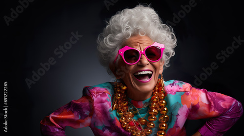 Crazy cool granny, elderly woman with headphones, sunglasses and gray hair, expressive mature and happy smiling grandmother in colorful close-up portrait | Generative AI