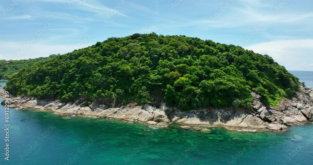 Aerial view Drone camera of seashore rocks in summer season, Beautiful sea surface, Amazing sea waves crashing on rocks seascape in Phuket island Thailand, Aerial view drone 4k High quality footage