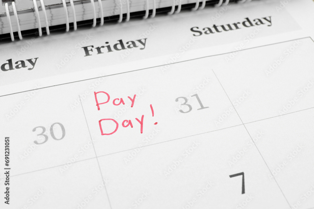 Calendar page with marked payday date as background, closeup Calendar page with marked payday date as background, closeup